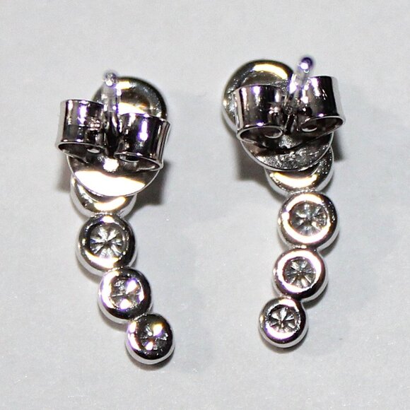 Sterling Silver Graduated Diamond Stud Earrings - Picture 2 of 4